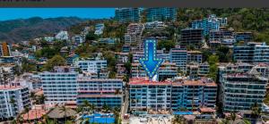 een luchtfoto van een stad met hoge gebouwen bij one beach street hotel -Beach front Spacious 1BD 1BA fabulous view in Zona Romantic Puerto Vallarta in Puerto Vallarta