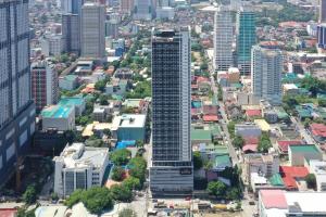 an aerial view of a city with tall buildings at The Suites at Torre Lorenzo Malate - Managed by The Ascott Limited in Manila