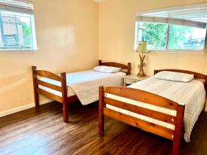 Postel nebo postele na pokoji v ubytování Mailan Hale Hostel