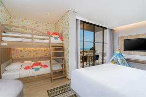 Кровать или кровати в номере Holiday Inn Resort Krabi Ao Nang Beach by IHG