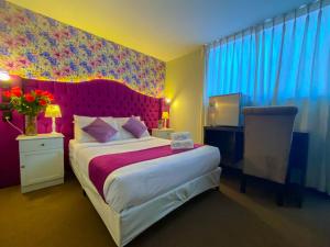 Ein Bett oder Betten in einem Zimmer der Unterkunft AM Hotels Collect