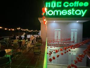 a cafe with a sign that reads no coffee homasy at Mộc Homestay in Quảng Ngãi