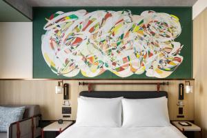 Caption by Hyatt Namba Osaka客房内的一张或多张床位