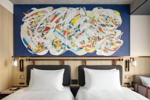Caption by Hyatt Namba Osaka客房内的一张或多张床位