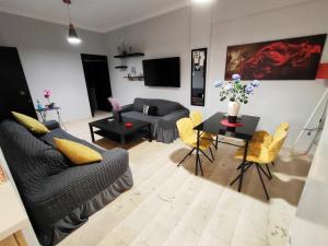 A seating area at Marlen House Chania