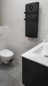 Et badeværelse på 'Games of Home' - logement T3 + 26 billeder