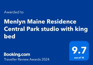 Un cartel azul con las palabras "menukinamine residence" Estudio Central Park con cama extragrande en Menlyn Maine Residences - Central Park with king sized bed, en Pretoria