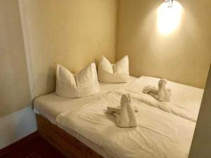 Postel nebo postele na pokoji v ubytování Villa Jugendglück FV 1 + 5 fotografií