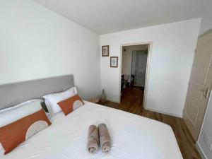 Una cama o camas en una habitación de Bel appartement vue mer - Mafat'appart