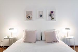 Pink Flat by Quokka 360 - close to the Italian border客房内的一张或多张床位