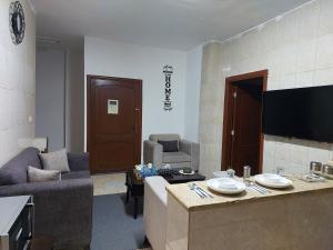 TV/trung tâm giải trí tại Cozy Home 4