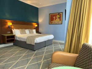 Postel nebo postele na pokoji v ubytování Prom Hotel + 37 fotografií