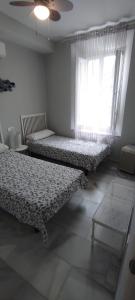 Posteľ alebo postele v izbe v ubytovaní Lovely Apartment in Pedregalejo