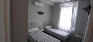 Posteľ alebo postele v izbe v ubytovaní Lovely Apartment in Pedregalejo