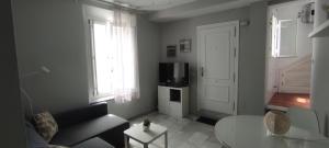 Televízia a/alebo spoločenská miestnosť v ubytovaní Lovely Apartment in Pedregalejo