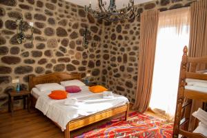 Postel nebo postele na pokoji v ubytování Khoreayi Dzor