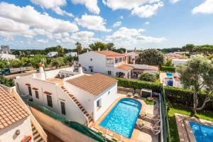 an aerial view of a house with a swimming pool at Villa Tia Dora in Cala en Blanes