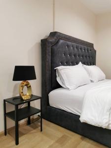 Postel nebo postele na pokoji v ubytování The One Hotel