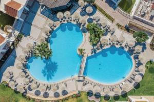 an overhead view of a swimming pool at a resort at Lindos Imperial Resort & Spa in Kiotari