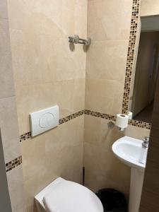 Koupelna v ubytování Hôtel Lyonnais