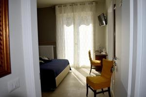 Posezení v ubytování Il Trovatore Rooms