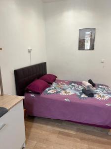Postel nebo postele na pokoji v ubytování Hôtel Lyonnais
