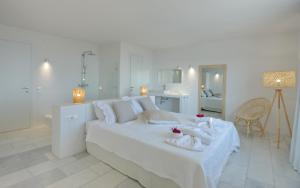 Кровать или кровати в номере Anemone Villas hotel