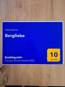 a blue credit card with a yellow box on it at Bergliebe in Sankt Martin am Tennengebirge