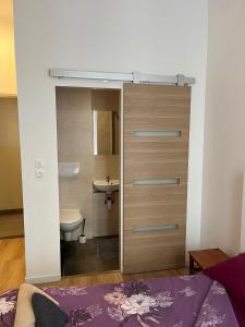 Koupelna v ubytování Hôtel Lyonnais