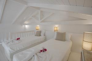 Кровать или кровати в номере Anemone Villas hotel