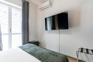 TV a/nebo společenská místnost v ubytování Fourooms - Bari Principe Amedeo + 31 fotografií