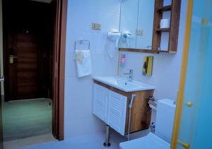 Koupelna v ubytování Jees Hotel