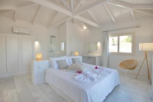 Кровать или кровати в номере Anemone Villas hotel