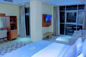 Postel nebo postele na pokoji v ubytování Jees Hotel