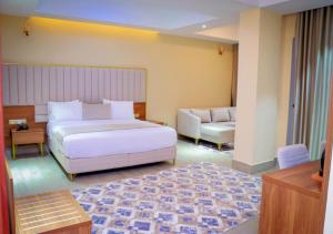 Postel nebo postele na pokoji v ubytování Jees Hotel