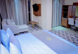 Postel nebo postele na pokoji v ubytování Jees Hotel
