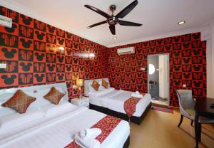 Postel nebo postele na pokoji v ubytování Seeds Hotel Shah Alam Seksyen 7 I-City