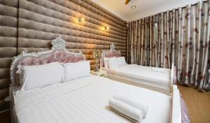 Postel nebo postele na pokoji v ubytování Seeds Hotel Shah Alam Seksyen 7 I-City