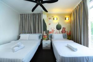 Postel nebo postele na pokoji v ubytování Seeds Hotel Shah Alam Seksyen 7 I-City
