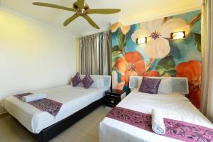 Postel nebo postele na pokoji v ubytování Seeds Hotel Shah Alam Seksyen 7 I-City