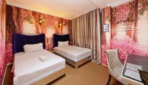 Postel nebo postele na pokoji v ubytování Seeds Hotel Shah Alam Seksyen 7 I-City