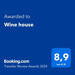 a blue text box with the words awarded to wine house at Wine house in Chablis