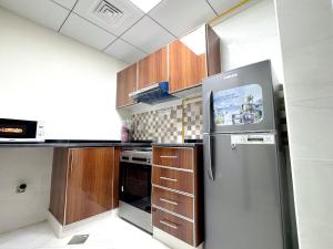 Kuchyň nebo kuchyňský kout v ubytování Lehbab Star Residence - Home Stay