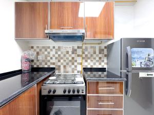 Kuchyň nebo kuchyňský kout v ubytování Lehbab Star Residence - Home Stay