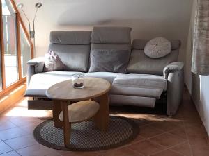 Posezení v ubytování Ferienwohnung Dreimaster W2