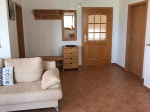 Posezení v ubytování Ferienwohnung Dreimaster W2