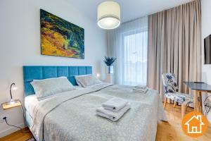Cama o camas de una habitación en Penthouse 100qm by Golden Tulip 3 Szlafzimmer 2 Bäder Terrasse Parking Free