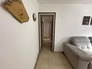 A seating area at Habitación Individual con terraza