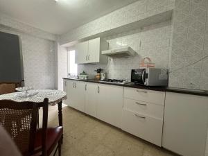 Kuchyňa alebo kuchynka v ubytovaní Habitación Doble en La Victoria