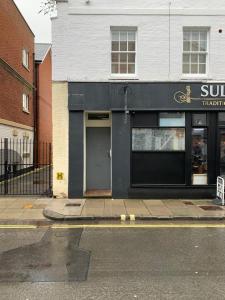 a building on the side of a street at Beautiful city centre apartment. in Salisbury